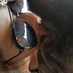 Puta brasileira lambendo o pau e o cuzinho do cachorro